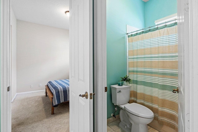 8940 New Hope Ct, West Palm Beach, FL 33411 - full bathroom with toilet, baseboards, and a shower with shower curtain