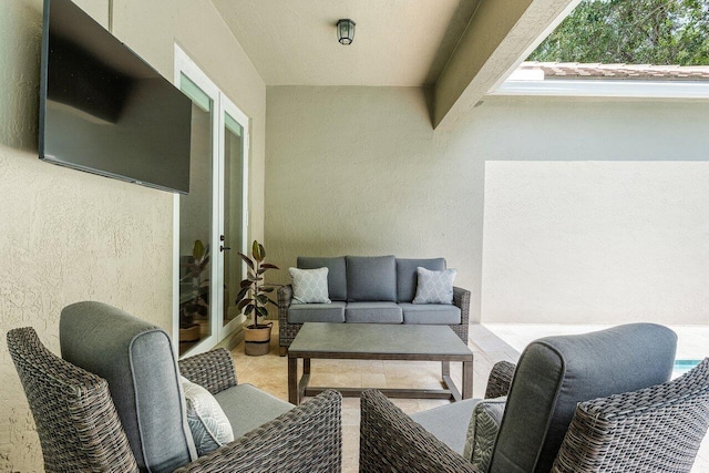8940 New Hope Ct, West Palm Beach, FL 33411 - view of patio featuring an outdoor living space