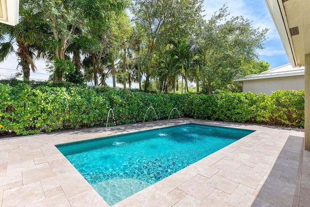 8940 New Hope Ct, West Palm Beach, FL 33411 - view of pool with a patio area