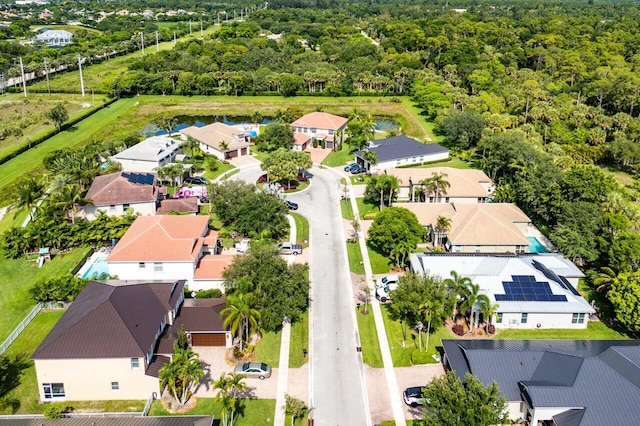 8940 New Hope Ct, West Palm Beach, FL 33411 - aerial view of residential area featuring a heavily wooded area