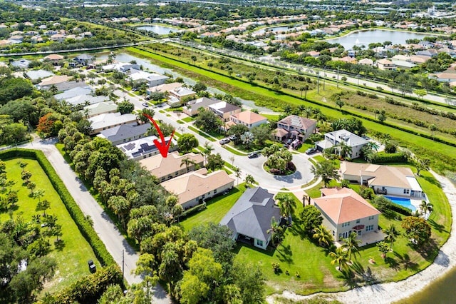 8940 New Hope Ct, West Palm Beach, FL 33411 - aerial view of residential area featuring a nearby body of water