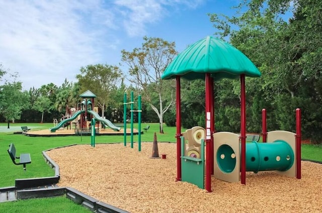 8940 New Hope Ct, West Palm Beach, FL 33411 - community play area with a yard and view of wooded area
