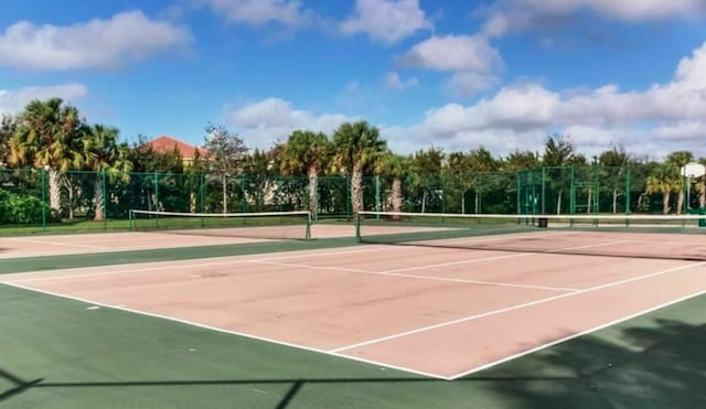 8940 New Hope Ct, West Palm Beach, FL 33411 - view of tennis court featuring community basketball court