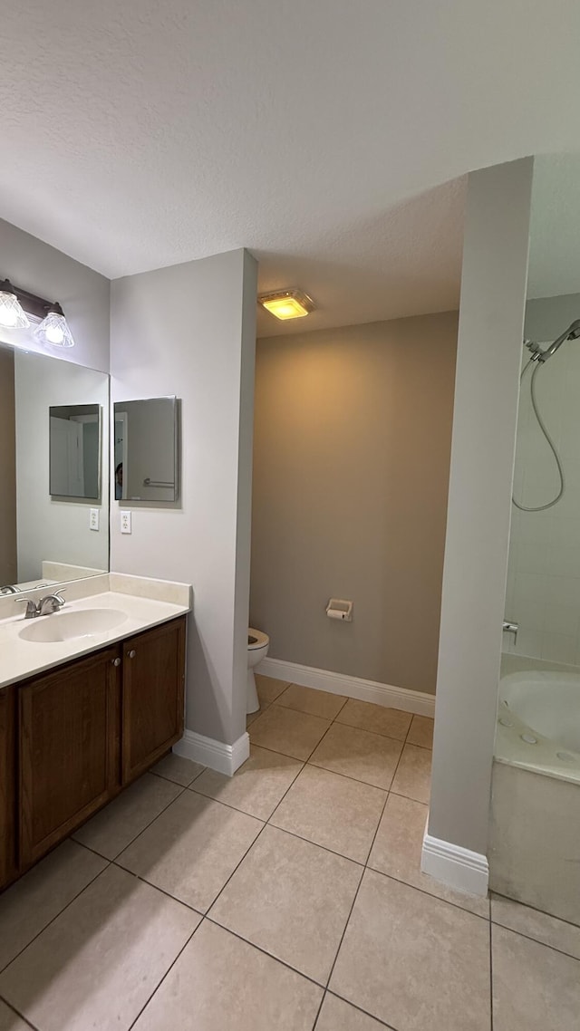 2134 SW Savage Blvd, Port Saint Lucie, FL 34953 - bathroom with vanity, tile patterned floors, toilet, baseboards, and shower / washtub combination