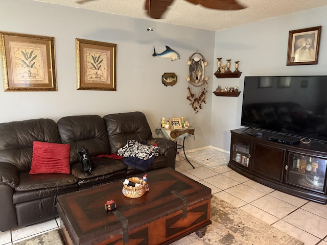 37 Waltham Unit B, West Palm Beach, FL 33417 - living area with light tile patterned flooring, ceiling fan, and a textured ceiling