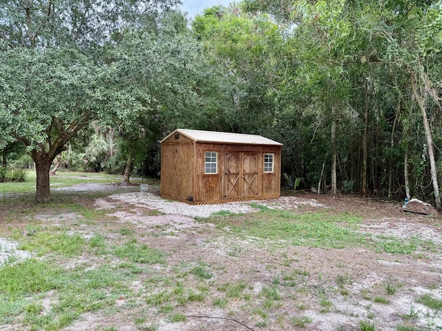 2812 F Rd, Loxahatchee Groves, FL 33470 - view of shed featuring a forest view