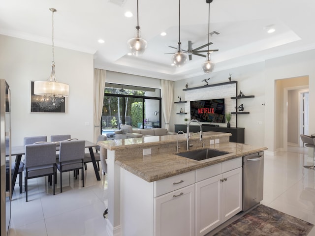 8784 Lewis River Rd, Delray Beach, FL 33446 - kitchen featuring a sink, open floor plan, stainless steel dishwasher, a raised ceiling, and recessed lighting