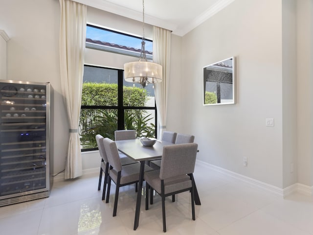 8784 Lewis River Rd, Delray Beach, FL 33446 - dining room with beverage cooler, a chandelier, ornamental molding, baseboards, and light tile patterned flooring