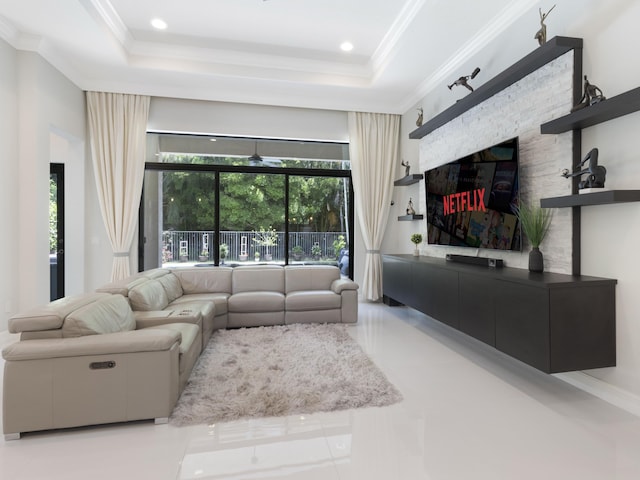 8784 Lewis River Rd, Delray Beach, FL 33446 - living area with a tray ceiling, crown molding, a glass covered fireplace, and recessed lighting
