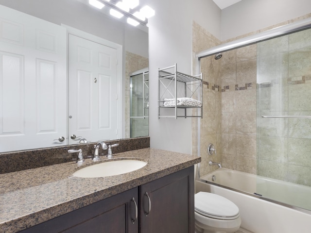 8784 Lewis River Rd, Delray Beach, FL 33446 - bathroom featuring vanity, toilet, and enclosed tub / shower combo