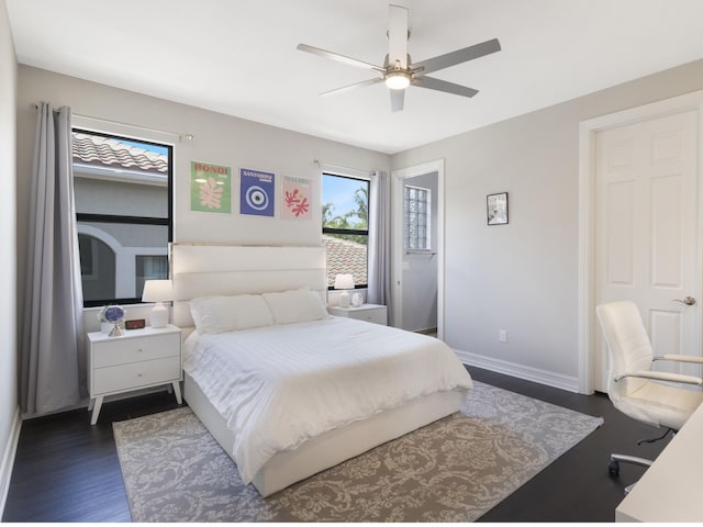 8784 Lewis River Rd, Delray Beach, FL 33446 - bedroom with dark wood finished floors, baseboards, and a ceiling fan