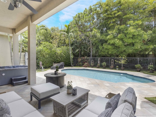 8784 Lewis River Rd, Delray Beach, FL 33446 - view of pool with a hot tub, a fenced backyard, a patio, ceiling fan, and an outdoor living space