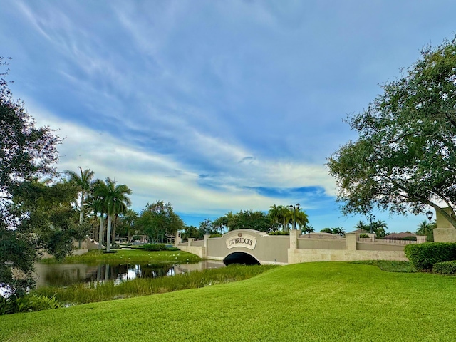 8784 Lewis River Rd, Delray Beach, FL 33446 - view of property's community featuring a water view and a lawn