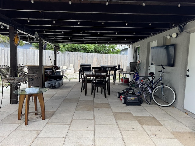 1413 S C Ter S, Lake Worth, FL 33460 - view of patio featuring outdoor dining space