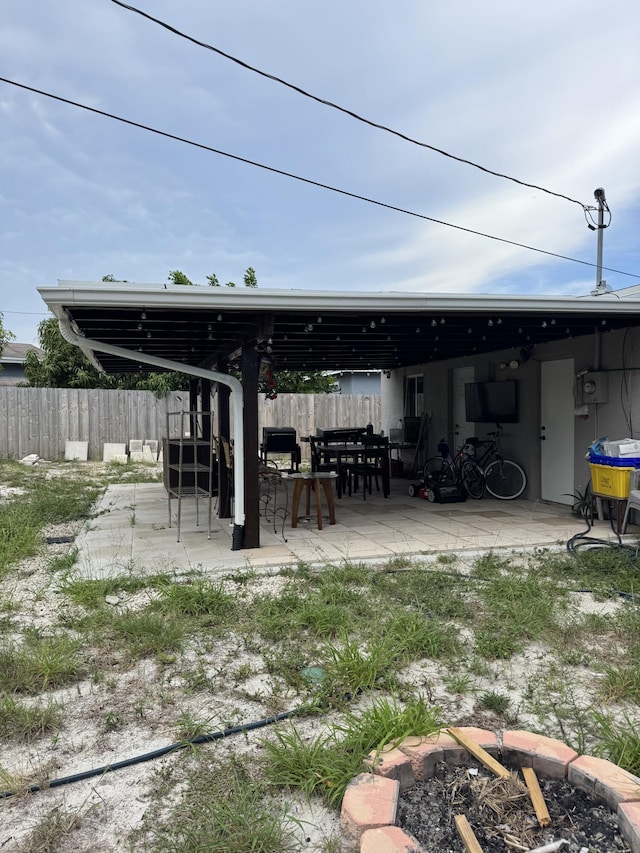 1413 S C Ter S, Lake Worth, FL 33460 - view of patio featuring a fire pit