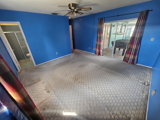 389 SE Tranquilla Ave, Port Saint Lucie, FL 34983 - carpeted spare room featuring ceiling fan and baseboards