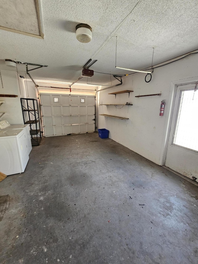 389 SE Tranquilla Ave, Port Saint Lucie, FL 34983 - garage featuring separate washer and dryer and a garage door opener
