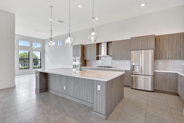 8660 W Parkland Bay Trl, Parkland, FL 33076 - kitchen featuring appliances with stainless steel finishes, wall chimney exhaust hood, backsplash, modern cabinets, and recessed lighting