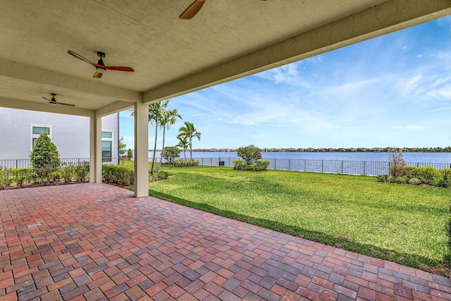 8660 W Parkland Bay Trl, Parkland, FL 33076 - view of patio / terrace featuring ceiling fan and a water view
