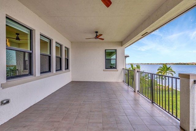 8660 W Parkland Bay Trl, Parkland, FL 33076 - balcony featuring a water view and ceiling fan
