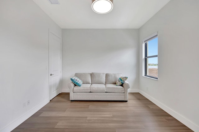 8660 W Parkland Bay Trl, Parkland, FL 33076 - living room with baseboards and wood finished floors