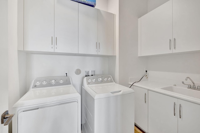 8660 W Parkland Bay Trl, Parkland, FL 33076 - laundry room with cabinet space and washing machine and clothes dryer
