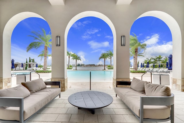 8660 W Parkland Bay Trl, Parkland, FL 33076 - view of patio featuring an outdoor hangout area and a community pool