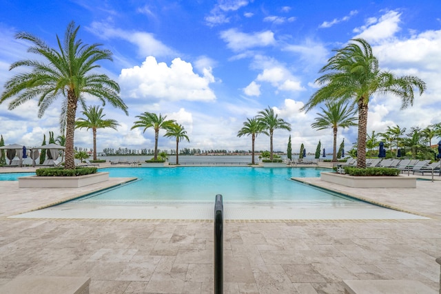 8660 W Parkland Bay Trl, Parkland, FL 33076 - community pool featuring a patio area