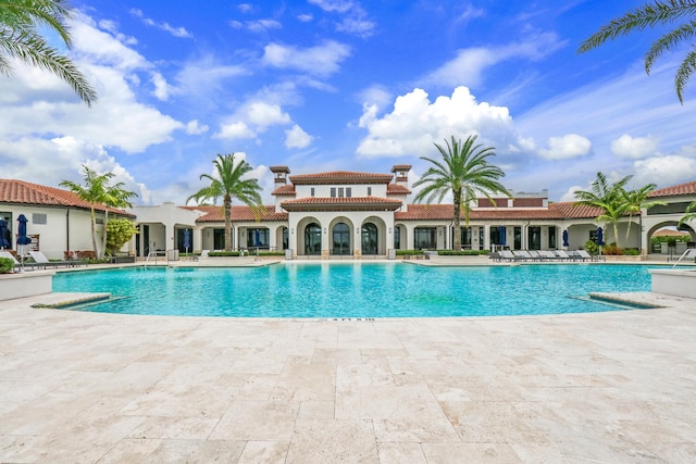 8660 W Parkland Bay Trl, Parkland, FL 33076 - community pool with a patio