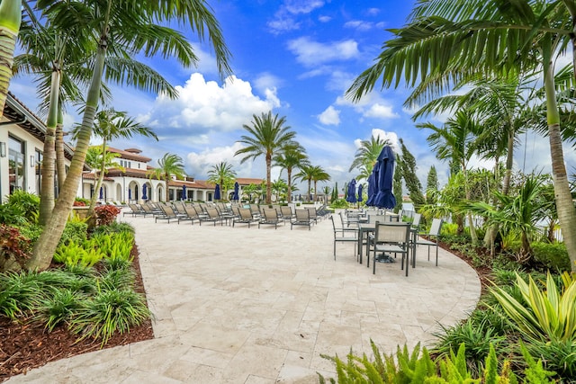 8660 W Parkland Bay Trl, Parkland, FL 33076 - view of patio / terrace with outdoor dining area