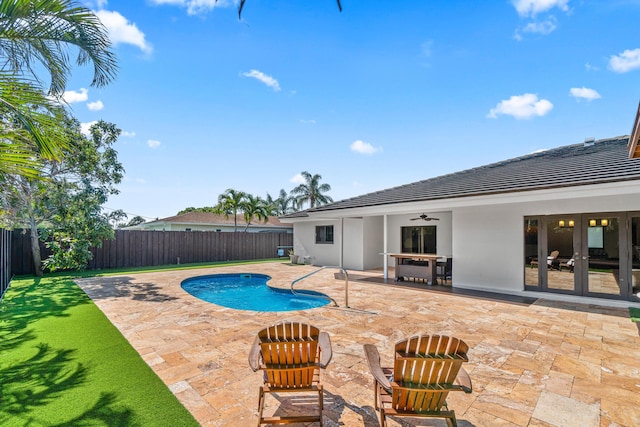 977 W Royal Palm Rd, Boca Raton, FL 33486 - view of swimming pool with french doors, a fenced backyard, a patio, and ceiling fan
