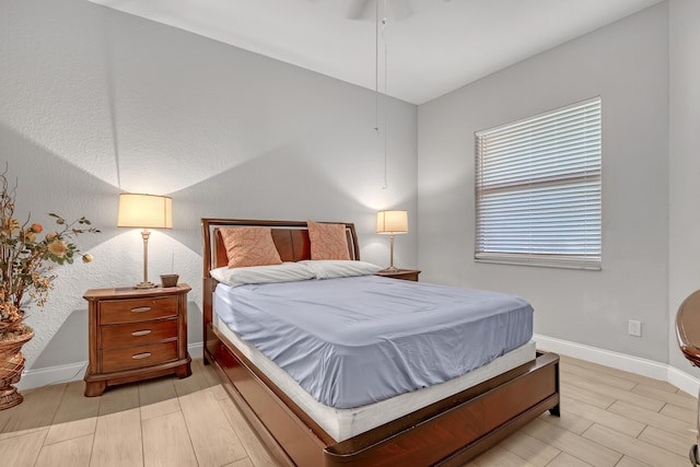 309 NE 11th Ave, Boynton Beach, FL 33435 - bedroom with wood finish floors, baseboards, and ceiling fan