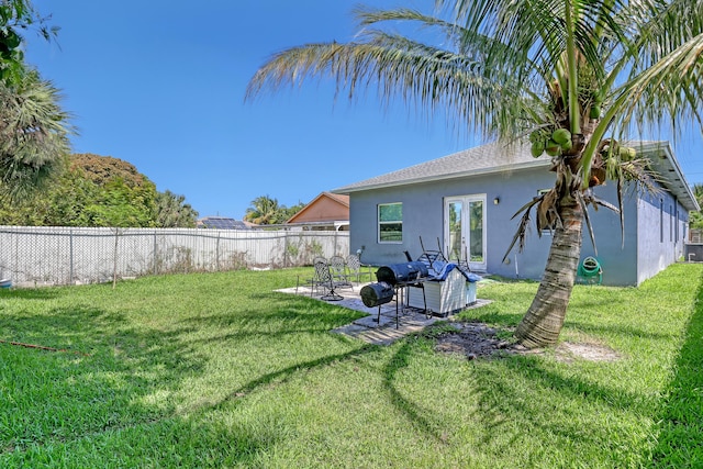 309 NE 11th Ave, Boynton Beach, FL 33435 - view of yard with a patio, central air condition unit, and french doors