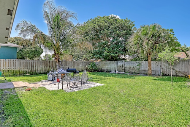 309 NE 11th Ave, Boynton Beach, FL 33435 - view of yard with a patio
