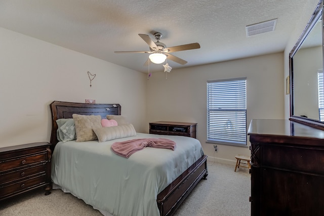 29 Mediterranean Blvd W, Port Saint Lucie, FL 34952 - bedroom with light carpet, a ceiling fan, baseboards, and a textured ceiling