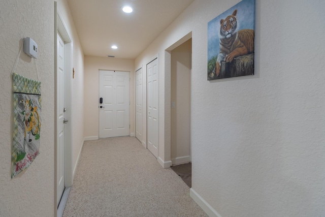 29 Mediterranean Blvd W, Port Saint Lucie, FL 34952 - hallway featuring carpet floors, recessed lighting, and baseboards