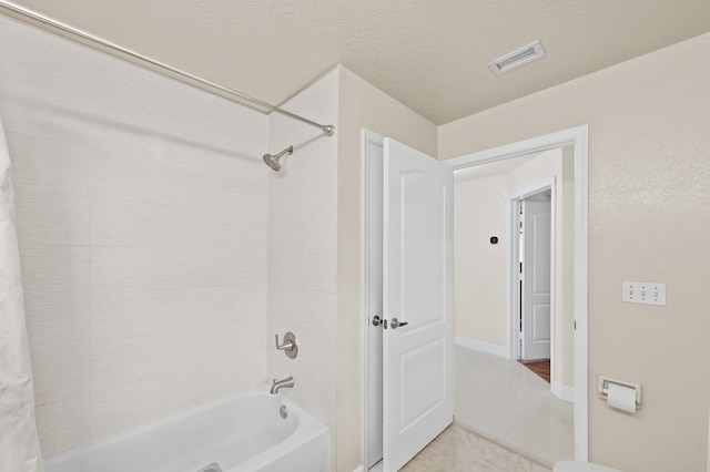 6839 Banyan Blvd, The Acreage, FL 33470 - full bath featuring tub / shower combination and a textured ceiling