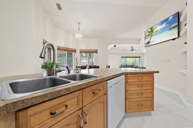 6839 Banyan Blvd, The Acreage, FL 33470 - kitchen featuring dishwasher, a sink, light marble finish flooring, pendant lighting, and a chandelier