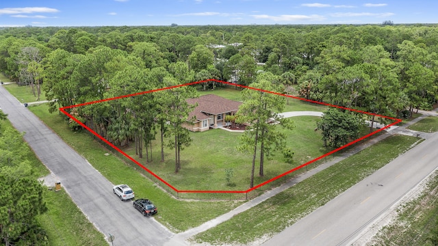 6839 Banyan Blvd, The Acreage, FL 33470 - view of subject property featuring a heavily wooded area and property boundaries highlighted