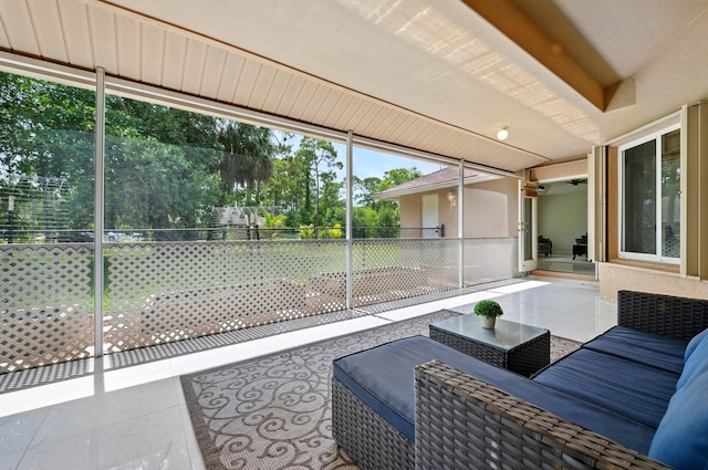 6839 Banyan Blvd, The Acreage, FL 33470 - sunroom / solarium with an outdoor living space