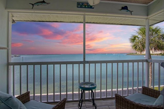 1177 Bayshore Dr Unit 207, Fort Pierce, FL 34949 - sunroom / solarium featuring a water view
