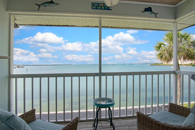1177 Bayshore Dr Unit 207, Fort Pierce, FL 34949 - sunroom featuring a water view
