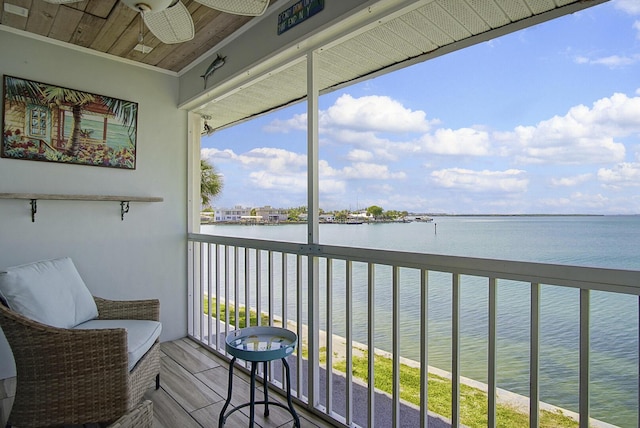 1177 Bayshore Dr Unit 207, Fort Pierce, FL 34949 - balcony featuring a water view and a ceiling fan