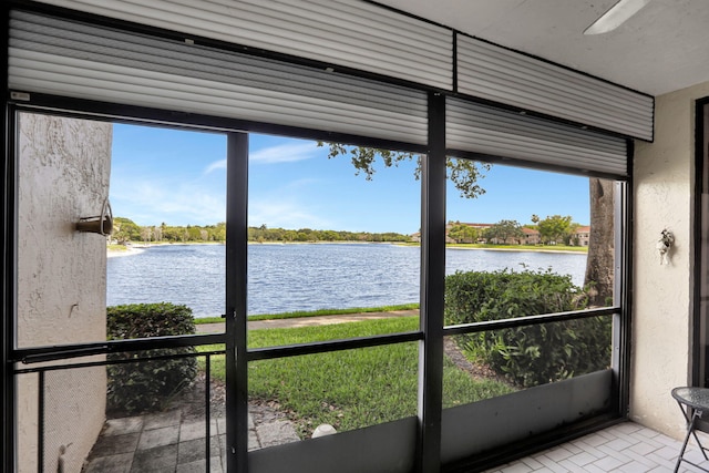 2850 Carambola Cir S Unit 19121, Coconut Creek, FL 33066 - unfurnished sunroom featuring a water view