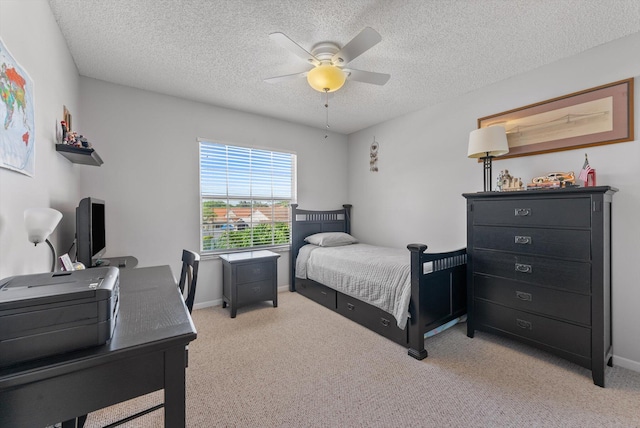 7930 Nolting Ct, Lake Worth, FL 33467 - bedroom with light colored carpet, a desk, a textured ceiling, a ceiling fan, and baseboards