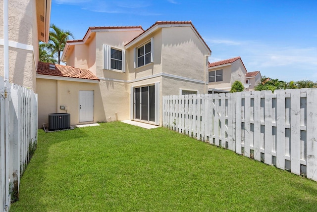 7930 Nolting Ct, Lake Worth, FL 33467 - back of property with a tiled roof, stucco siding, and cooling unit
