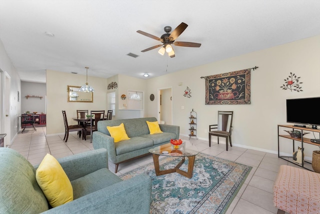 7930 Nolting Ct, Lake Worth, FL 33467 - living area with light tile patterned flooring, ceiling fan, and baseboards