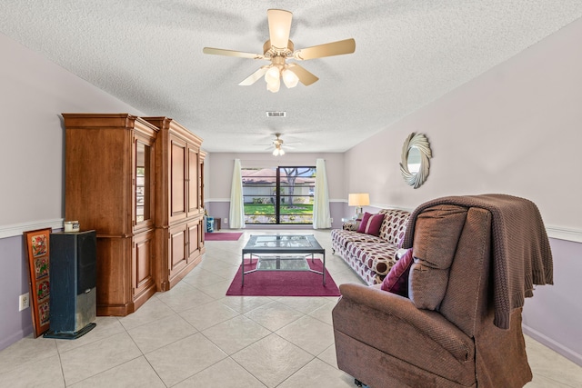 4731 Storkwood Ln Unit A, Boynton Beach, FL 33436 - living area with a textured ceiling, a ceiling fan, and light tile patterned floors