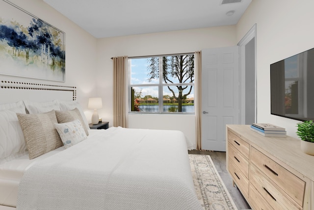14841 Strand Ln (), Unit Delray Beach, FL 33446 - bedroom featuring wood finished floors and a water view