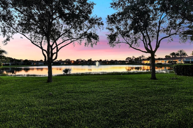 14841 Strand Ln (), Unit Delray Beach, FL 33446 - yard at dusk featuring a water view and a yard
